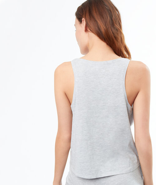 Top z napisem gris.